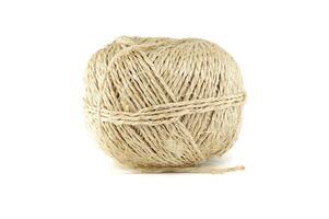 Closeup of natural twine ball isolated on white background photo