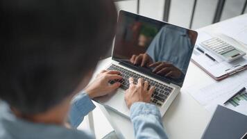 Business man working with laptop Hands typing keyboard. Professional investor working new start up project. business planning in office. Technology business. photo