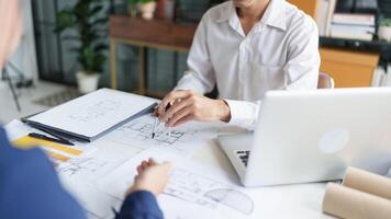 Architecture drawing on architectural project business architecture building construction Colleagues designer Planning Design on blueprint and compasses photo