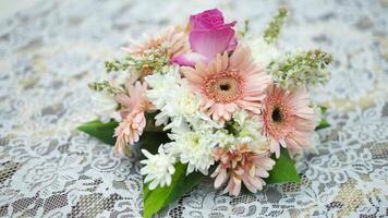 Fresh flowers arranged beautifully as a table centerpiece, adding a touch of nature and elegance. Perfect for decor, event design, or lifestyle projects showcasing beauty and sophistication video