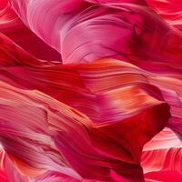 The stunning sandstone walls of Antelope Canyon showcase vibrant reds and intricate patterns, illuminated beautifully by the midday sun filtering through the narrow passage photo
