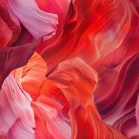 Waves of red and pink sandstone create captivating patterns in Antelope Canyon, illuminated by gentle light filtering through the narrow passageways, highlighting the natural beauty photo