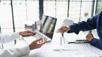 Architecture drawing on architectural project business architecture building construction Colleagues designer Planning Design on blueprint and compasses photo