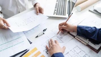 Architecture drawing on architectural project business architecture building construction Colleagues designer Planning Design on blueprint and compasses photo