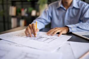 Architecture Man drawing on architectural Creative project business architecture building construction Industrial engineering Achievement Planning photo