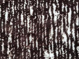 Fill inframe photo, close up of a carpet pattern. Soft fur carpet. Suitable for your home. photo