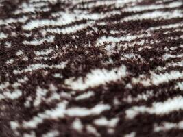 Fill inframe photo, close up of a carpet pattern. Soft fur carpet. Suitable for your home. photo