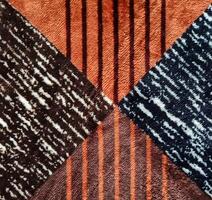 Fill inframe photo, close up of a carpet pattern. Soft fur carpet. Suitable for your home. photo
