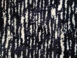 Fill inframe photo, close up of a carpet pattern. Soft fur carpet. Suitable for your home. photo