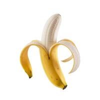 A single sliced banana resting on a plain white surface photo