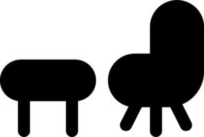 A black and white silhouette of a chair and table vector