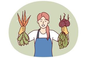 Woman is happy about good harvest of beets and carrots and demonstrates fresh vegetables vector