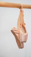 Pointe shoes footwear emblem of classical dance used by dancers to dance photo