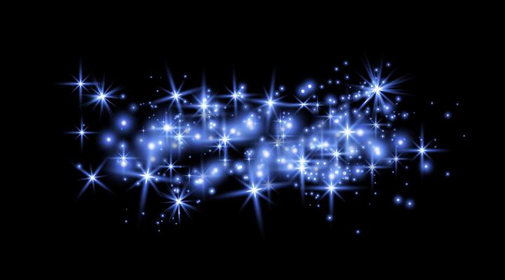 Blue magic sparks and dust stars. Blue glow flare light effect. Christmas light effect particles on black background.