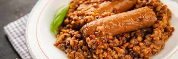 Lentil with sausage tasty food dish second course fresh gourmet food background on the table rustic food top view copy space top view photo