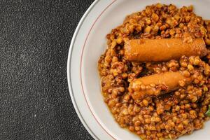 Lentil with sausage tasty food dish second course fresh gourmet food background on the table rustic food top view copy space top view photo