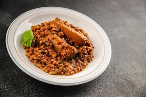 Lentil with sausage tasty food dish second course fresh gourmet food background on the table rustic food top view copy space top view photo
