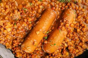 Lentil with sausage tasty food dish second course fresh gourmet food background on the table rustic food top view copy space top view photo