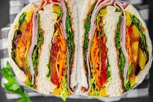 sandwich layers vegetables and ham meat spam fresh meal food snack on the table copy space food background rustic top view photo