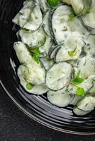 cucumber salad fresh cream tasty food dish fresh delicious gourmet background on the table rustic food top view copy space top view keto and paleo diet Vegetarian and vegan food photo