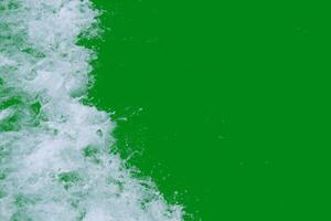Abstract Green and White Water Texture with Dynamic Splashing Waves in Motion Captured in High Resolution photo