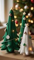 Handmade knitted Christmas tree decorations with green white color scheme for indoor holiday dcor photo