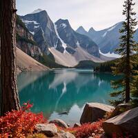 Autumn and Winter landscapes blend within scenic images featuring lakes and mountains photo