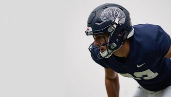 A helmetdonned football player sporting a brain design showcasing the nexus of athletics wellness and tech for enhanced safety and performance photo