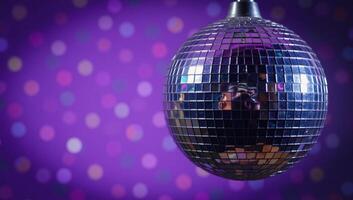 Vibrant disco ball against a purple bokeh backdrop photo