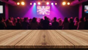 A blurred discoclub backdrop showcases an empty wooden table intended for product demonstrations photo