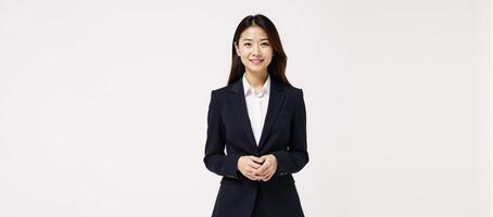Businesswoman in suit against white backdrop photo