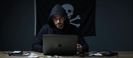 Hooded hacker depicted with computer working on illicit activities in a cybersecurity context piracy banks money highresolution portrait photo