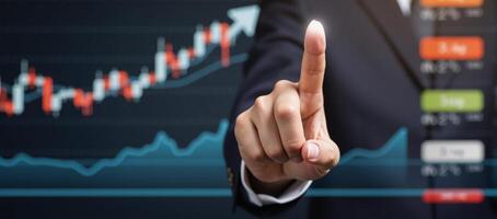 Pointer highlights upward trend on stock market chart signifying growth and prosperity photo