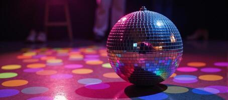 A glittering disco ball surrounded by twinkling lights photo