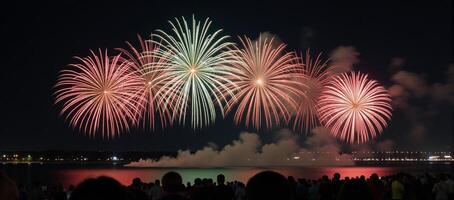 Fireworks create festive abstract holiday atmosphere at night photo