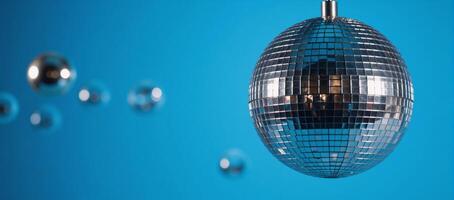 Vibrant blue backdrop with glittering disco ball for a lively party mood photo