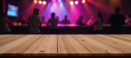 A blurred discoclub backdrop showcases an empty wooden table intended for product demonstrations photo