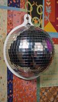 Disco ball digital sticker placed as a collage element in the image backdrop photo