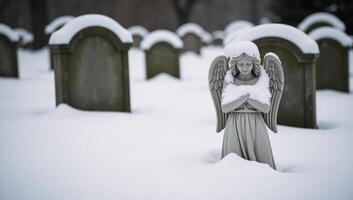 Wintery scene featuring snowcovered angel statue as a poignant representation of sorrow and reminiscence within a cemetery photo