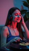 Girl enjoys relaxing with lofi visuals during evening music sessions photo