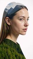 Woman in a doubleexposure portrait set against a verdant forest mountain landscape designed using environmental elements photo