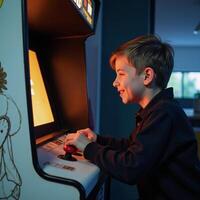 Boy interacting with vintage gaming console photo