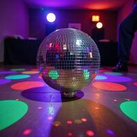 A glittering party scene centered around a large disco ball photo