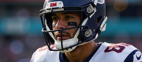 Closeup image Super Bowl American Football Player in uniform and helmet photo