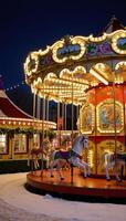 A festive carousel wonderland shimmering with twinkling lights and decor photo