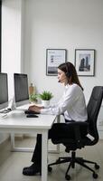 A dedicated employee delivering technical support and expertise within a streamlined office environment photo