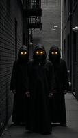 Three sinister hooded figures with glowing yellow eyes are seen lurking in a dark alleyway photo