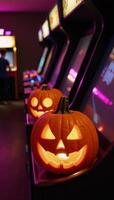 Retro arcade game room illuminated by Halloween pumpkins photo