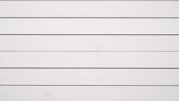 Rustic white wooden background with classic grunge texture ideal for various design photo and creative uses