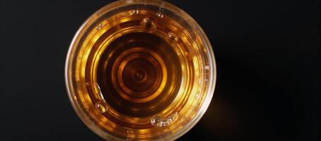 Topdown perspective of whiskey in a glass photo